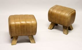 A PAIR OF LEATHER POMMEL HORSE STYLE STOOLS 1ft long.