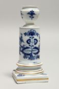 A SMALL MEISSEN PORCELAIN PEDESTAL CANDLESTICK painted in blue and gilt with floral sprays. 5.