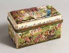 A CAPODIMONTE CASKET, with moulded decoration depicting classical figures and ormolu mounts 10ins