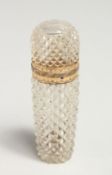 AN 18CT GOLD MOUNTED CUT GLASS SCENT BOTTLE 2.25ins long.