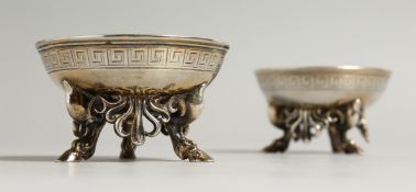 A PAIR OF VICTORIAN SILVER CIRCULAR SALTS. London.