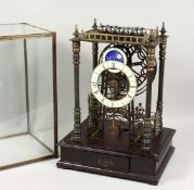 A GOOD FOUR COLUMN BRASS SKELETON CLOCK with two dials and moon face, on a stand with single