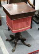 A 19TH CENTURY WORK TABLE, POSSIBLY ISLE OF MAN, with rising top fitted interior, supported on
