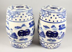A PAIR OF CHINESE BLUE AND WHITE BARREL SEATS 18ins high.