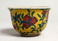 A YELLOW CHINESE PORCELAIN BOWL. 3.25 diameter.