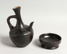 A POTTERY EWER AND BOWL 8.5ins high.