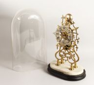 A VERY GOOD BRASS SKELETON CLOCK striking on a simple bell with glass dome 16ins high.