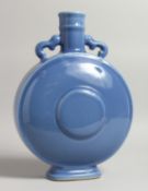 A CHINESE BLUE MOON VASE with two swivel handles six character mark in blue 14ins high.