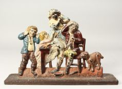 A VICTORIAN BRONZE CAST IRON DOOR STOP, chicken on a fence. 11ins long.