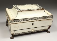 A GOOD ANGLO INDIAN IVORY JEWEL BOX with fitted interior and single drawer on claw feet. 10ins