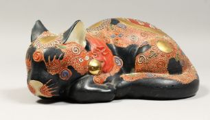 A JAPANESE SATUMA SLEEPING CAT 9.5ins long