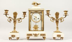 A GOOD FRENCH LOUIS XVITH DESIGN WHITE MARBLE AND ORMOLU THREE PIECE CLOCK GARNITURE, the clock with