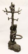 A GOOD LARGE BLACK FOREST STYLE CAST BRONZE BEAR HALL STAND, of typical form with a bear holding