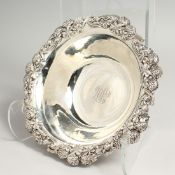 A TIFFANY & CO. STERLING SILVER CIRCULAR BOWL, the borders with cast crysanthemums and clover. 9.