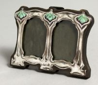 A SMALL DOUBLE SILVER PHOTOGRAPH FRAME 3ins x 4ins.