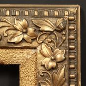 A decorative gilt frame with pebbled slip, rebate size - 8