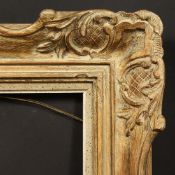 A 20th Century carved frame, rebate size - 14.5