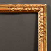 A 20th Century Continental carved wood frame, rebate size - 31.5