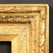 A 19TH Century Continental gilt composition frame, rebate size - 21.25