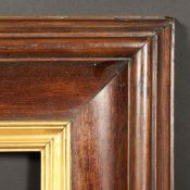 A Continental polished hardwood frame with gilded slip, rebate size - 29.75