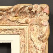 An Early 20th Century French carved frame, rebate size - 18