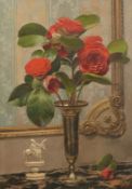 Fortunio Matania (1881-1963) Italian, A still life of red flowers and an ornament on a marble table,