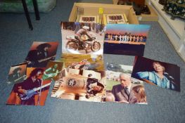 A quantity of press and publicity photographs depicting musicians, rock stars and sportsmen to