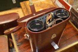 A leather cased pair of Carl Zeiss binoculars.