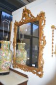 A very good pair of carved giltwood framed pier mirrors.