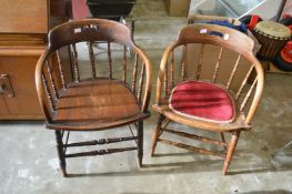 Four spindle back chairs, two with arms.