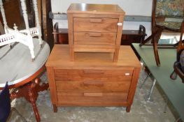 Two modern hardwood chests.