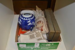 A Chinese ginger jar and other decorative items.