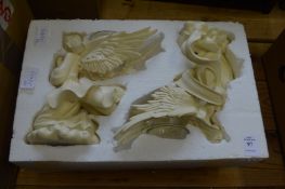 A pair of decorative candles holders.