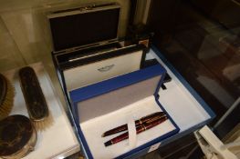 A Waterman pen set, a quantity of other pens and inks.