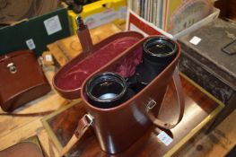 A leather cased pair of Carl Zeiss binoculars.