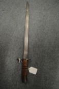 A bayonet with leather covered scabbard, a leather swagger stick and the nose of shell /