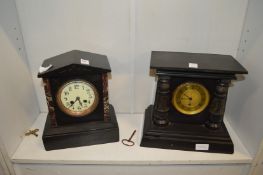 Two Victorian slate mantle clocks.