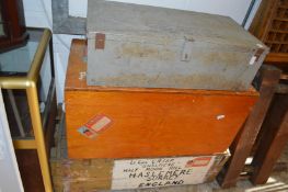 A steel ammunition trunk and two other trunks.