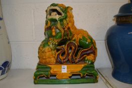 A good Chinese Sancai glazed pottery figure of a lion dog.