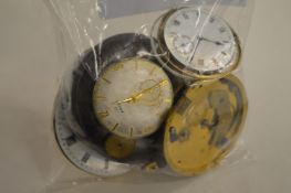 Various watch parts.