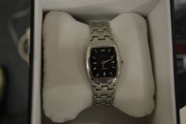 A Gucci stainless steel wristwatch, boxed.