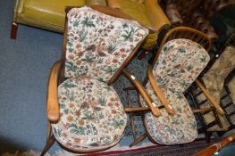 Two Ercol armchairs.