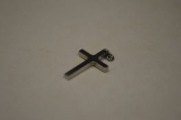 An unusual stainless steel crucifix pendant (made by Mick Griffiths).