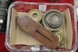 A set of brass cup weights, Salter spring balance and other weights.