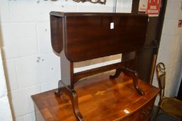 A small mahogany drop flap table.