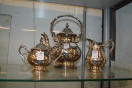 A plated three piece tea service.