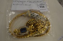 A decorative necklace mounted with a leopard.