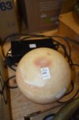 An unusual heavy globular shaped alabaster lamp.