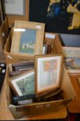 Two boxes of paintings and prints.