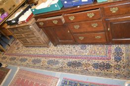 A large beige ground Isfahan style machine made carpet.